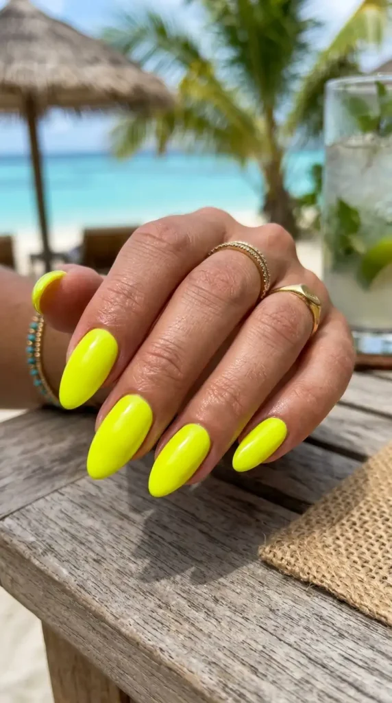 Yellow Nail Ideas: 20 Trendy Designs That Brighten Every Season neon yellow nails glossy finish 202605100946 optimized